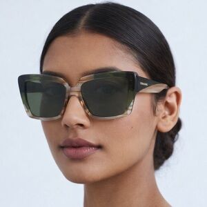 Salvatore Ferragamo sunglasses. Full inclusion
